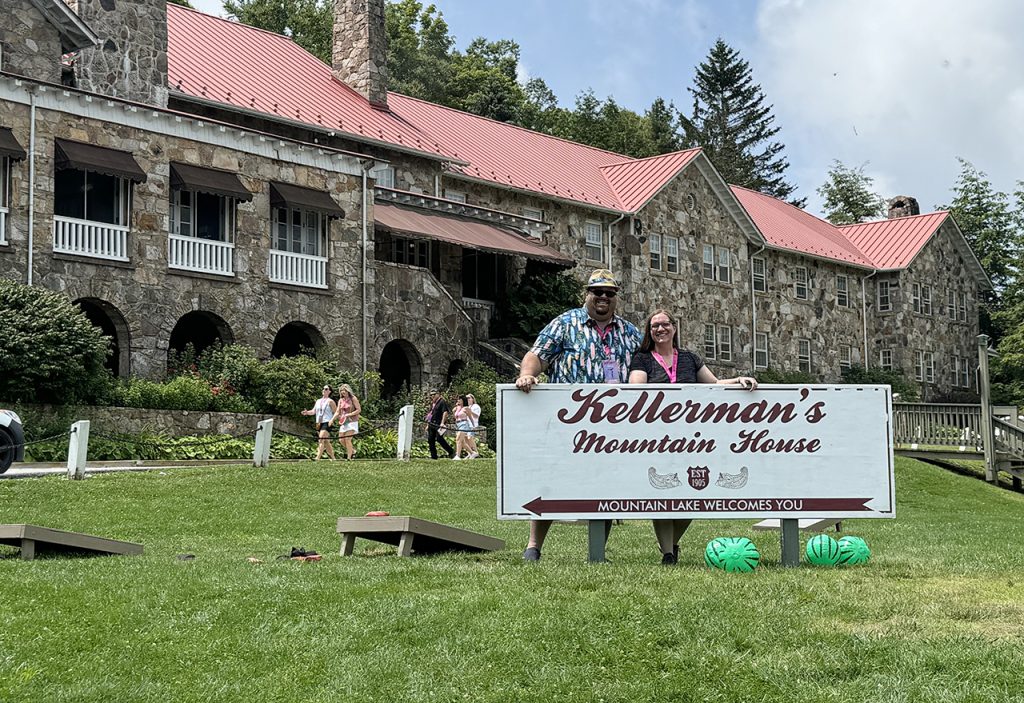 Craig and Wendy behind Kellermans sign Mountain Lake Lodge Virginia