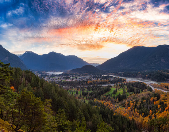 Panoramic View of modern city, Hope, in British Columbia, Canada. Sunny Fall Season. Colorful Sunset Art Render. Thacker Mountain Hike Viewpoint. Background Panorama