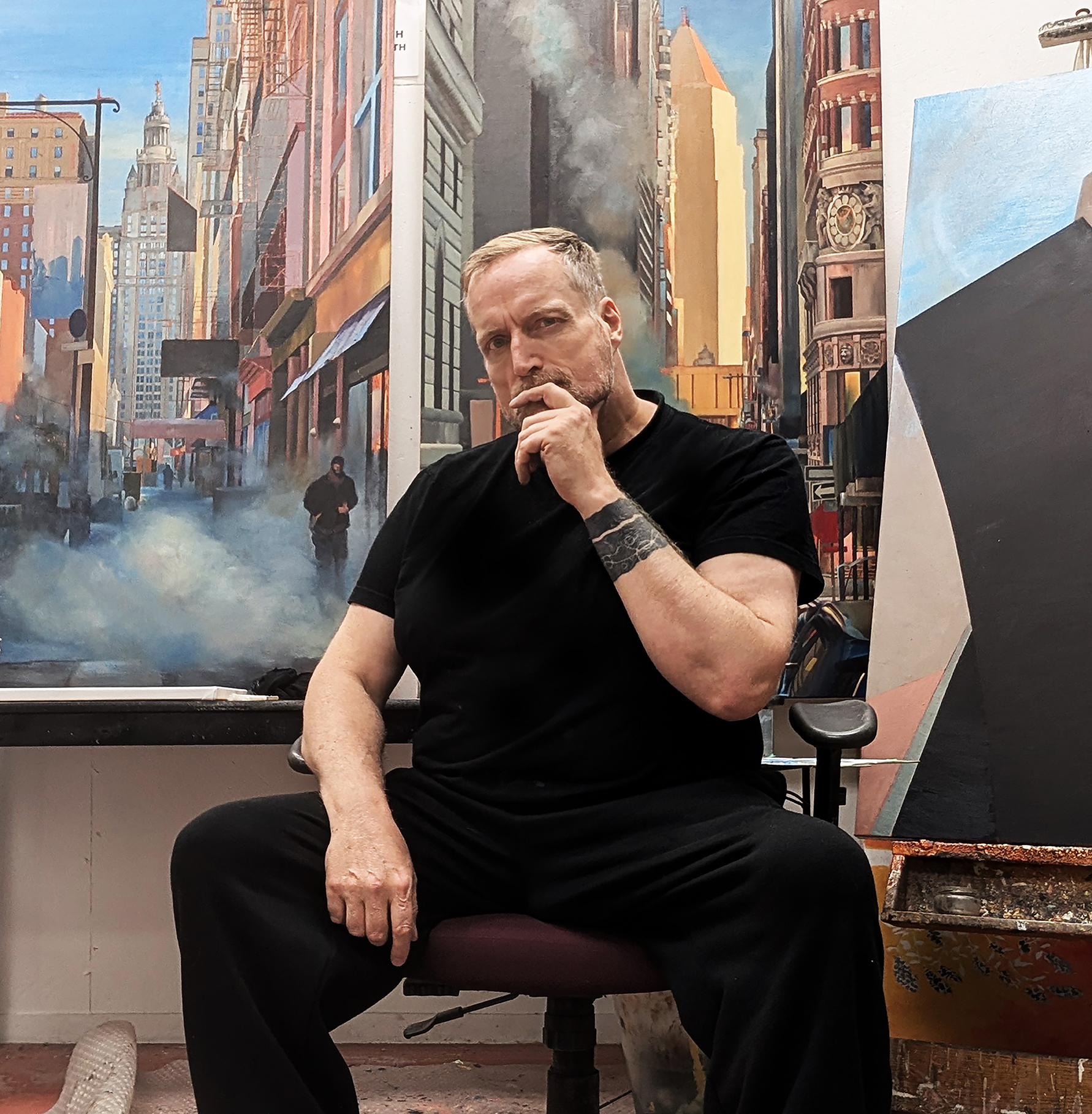 James Huctwith painting in his studio at 44 Gaukel Street in Kitchener Ontario